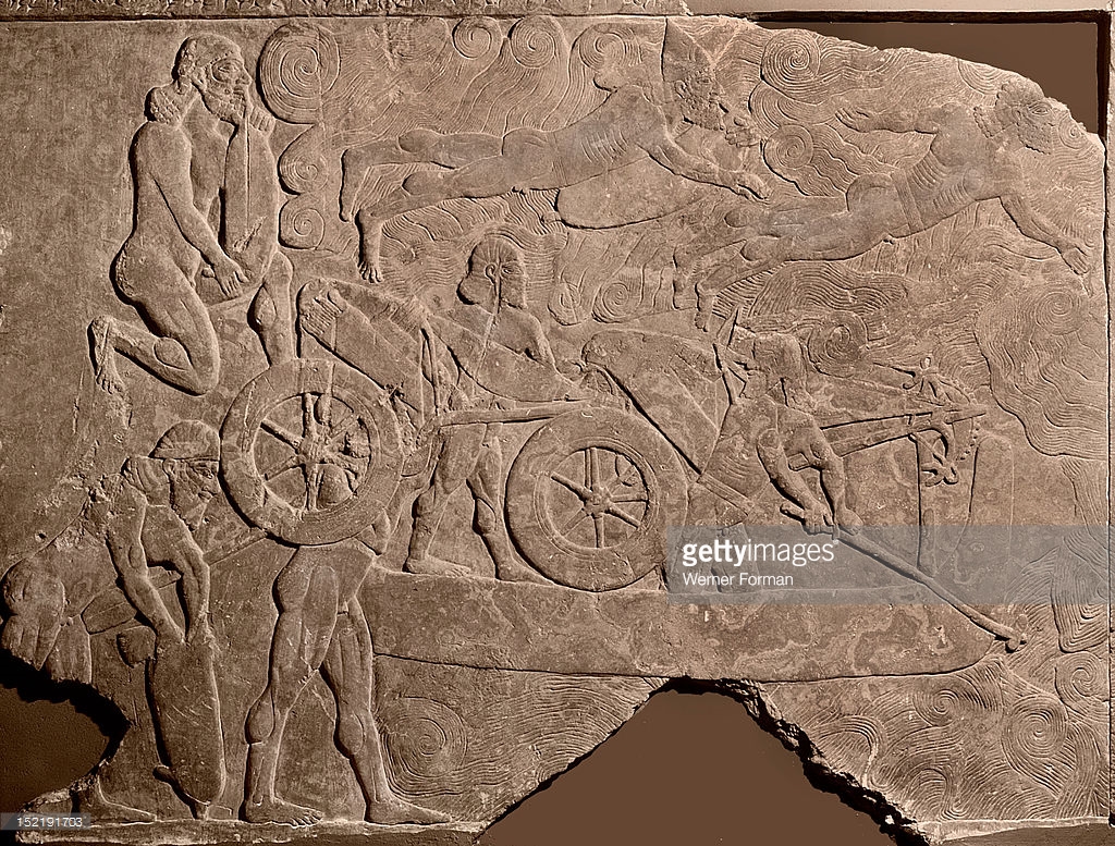 سربازان آشوری در حال عبور دادن یک ارابه از رودخانه